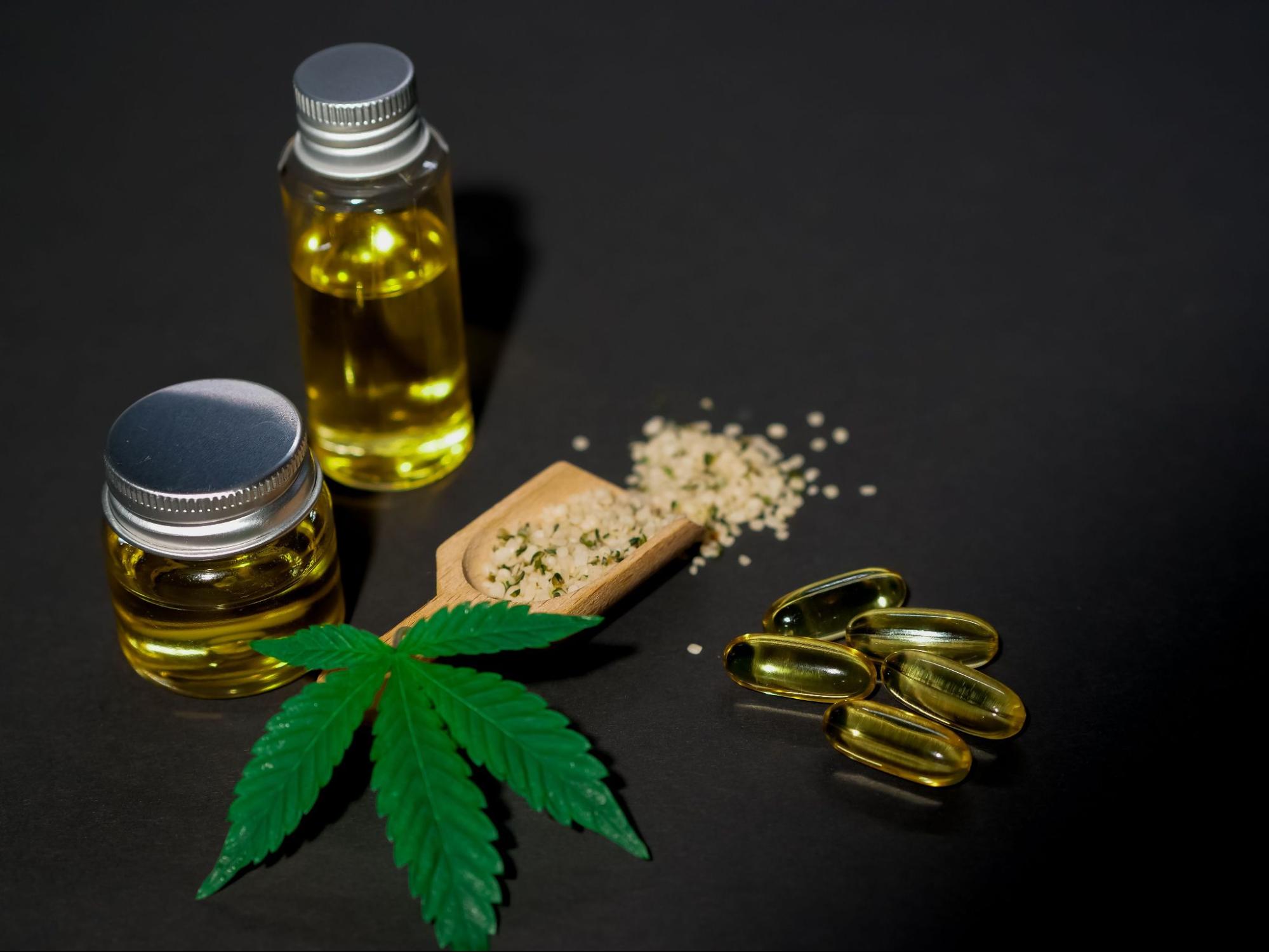 An image of cannabis oil, leaves and capsules. Source - Pexels